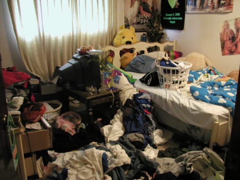 really very messy cluttered bedroom