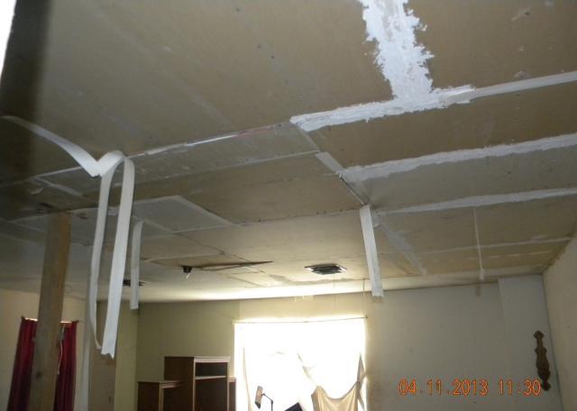 ugly family room ceiling damage peeling dirty fixer-upper short sale Peoria Arizona home house real estate photo