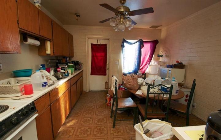 cluttered messy kitchen cabinets too much stuff on counters poor bad home staging Mesa Arizona house for sale