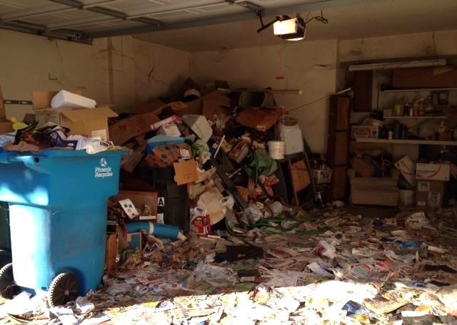 hoarder hoarding piles of garbage junk filth dirt messy gross disgusting garage completely filled Phoenix Arizona home house for sale