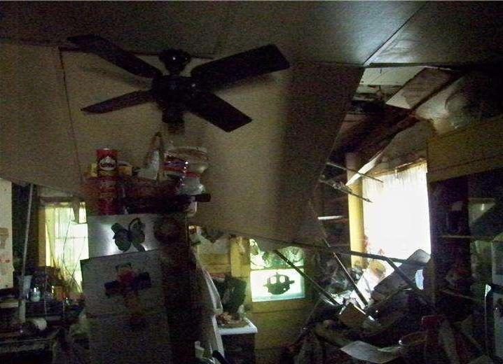 very messy cluttered junk chaotic kitchen poor bad home staging Philadelphia Pennsylvania house for sale photo hoarding