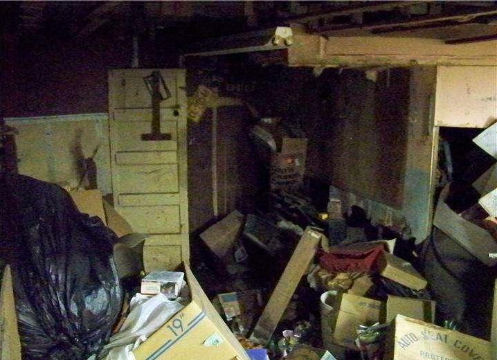 very messy cluttered junk chaotic basement poor bad home staging Philadelphia Pennsylvania house for sale photo hoarding