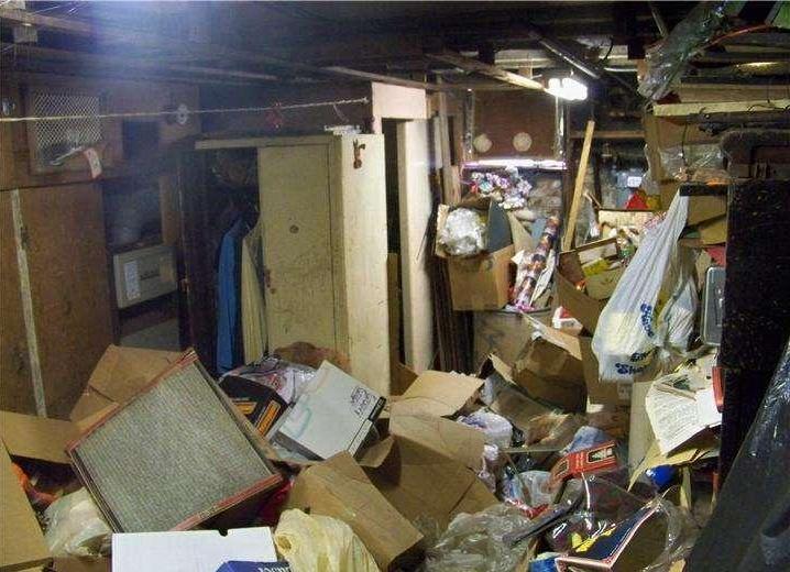 very messy cluttered junk chaotic basement poor bad home staging Philadelphia Pennsylvania house for sale photo hoarding