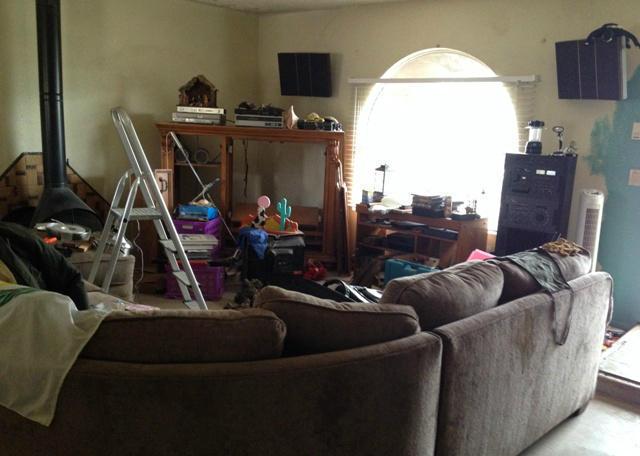 messy cluttered stuff junk everywhere living room fixer-upper neglected Phoenix Arizona home house for sale
