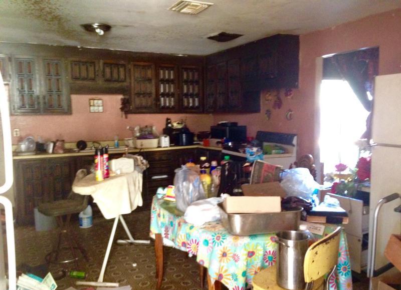 messy cluttered junky neglected kitchen ugly John F. Long cabinets dirty fixer-upper Phoenix Arizona homes houses for sale photo