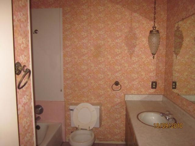 old ugly pink wallpaper bathroom Phoenix Arizona home house real estate photo