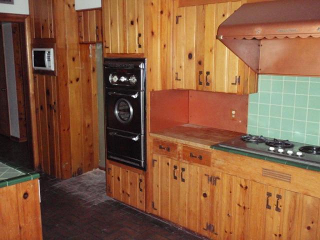 vintage old original 1955 kitchen oven range hood wood paneling cabinets Phoenix Arizona