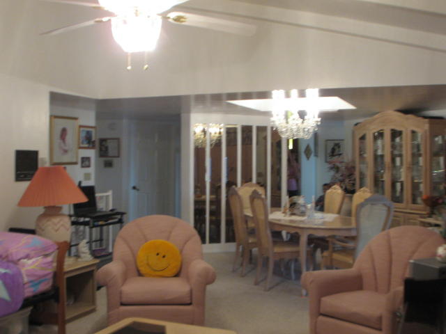 smiley face pillow in a house home for sale real estate photo Phoenix Arizona have a nice day