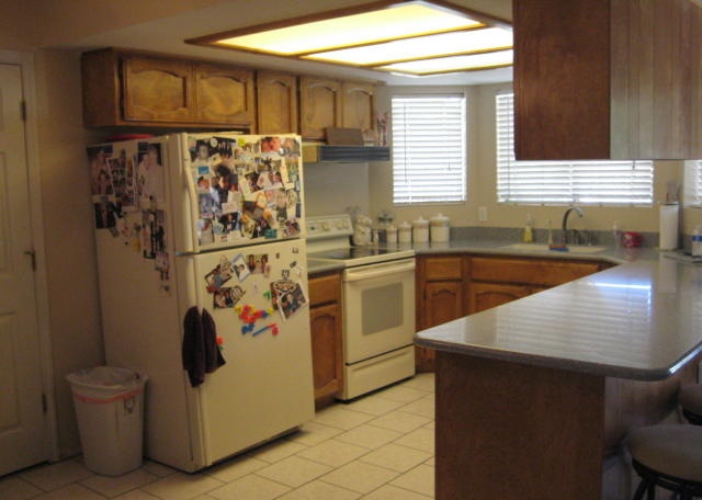 too many refrigerator magnets on display while selling house home Mesa Arizona photo