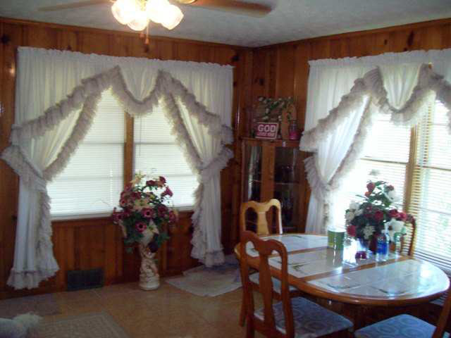 hideous ugly tacky gaudy frilly frills window curtains drapes covering Campbellville Kentucky home house