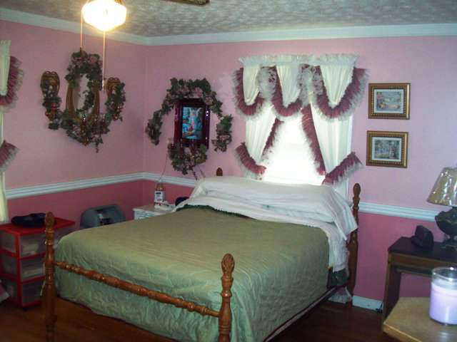 hideous ugly tacky gaudy frilly frills window curtains drapes covering Campbellville Kentucky home house