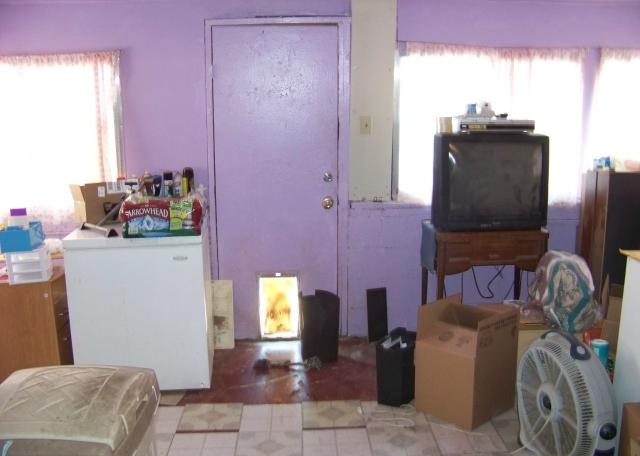 cluttered messy disorganized family room poor bad home staging Phoenix Arizona house