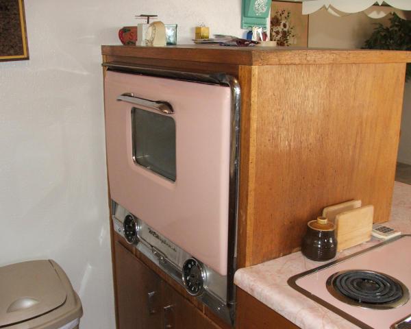 original vintage pink paint wall oven kitchen 1960 Phoenix Arizona home house for sale photo