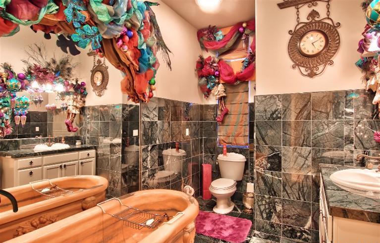 too many Christmas decorations bathroom cluttered look staging Elk Grove California home house for sale photo