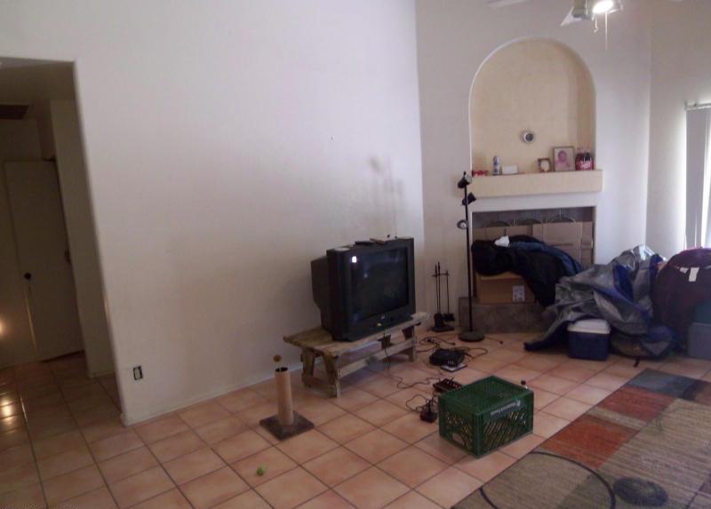TV video games cluttered fireplace blocked covered up living room short sale Gilbert Arizona home house photo