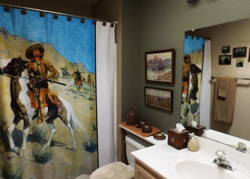 shower curtain cowboy ranger rifle horses bathroom Sun City West Arizona home house for sale photo