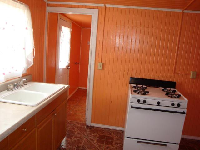 tacky ugly floor tile kitchen bright wall paint colors bad MLS photos Phoenix home house