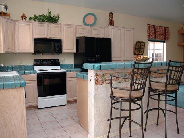 Southwest décor interior design decorations blue tile counters tacky outdated Phoenix home