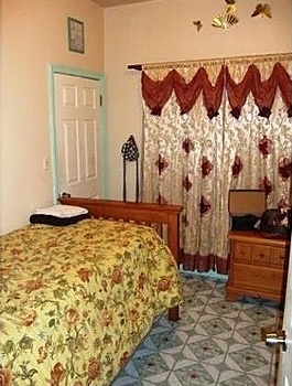 tacky ugly décor bedroom curtains drapes bedspread floor Milwaukee Wisconsin home house