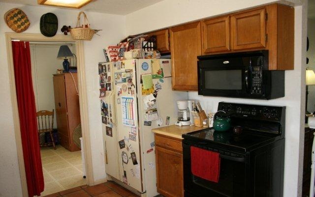 too many refrigerator magnets on display while selling house home Mesa Arizona photo