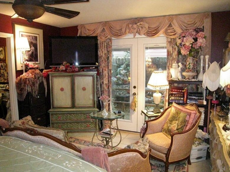 heavy crowded cluttered shabby chic over the top gaudy décor The Woodlands Texas home house for sale