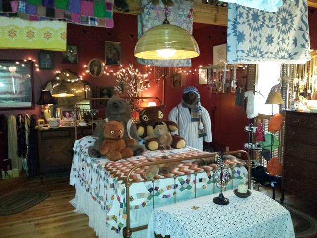 teddy bear stuffed animal collection quilts cluttered bedroom Penfield New York home house for sale
