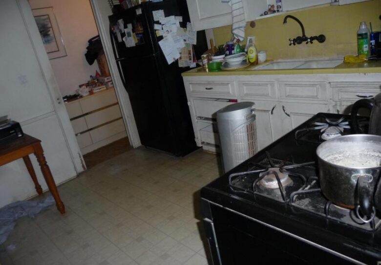 cluttered messy disorganized kitchen poor bad home staging Phoenix Arizona house for sale photo