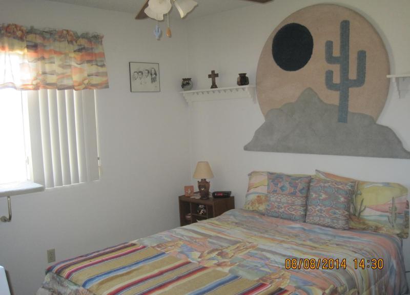 Southwest décor pastel colors cactus saguaro bedspread bedroom decoration Mesa Arizona homes houses for sale real estate photo