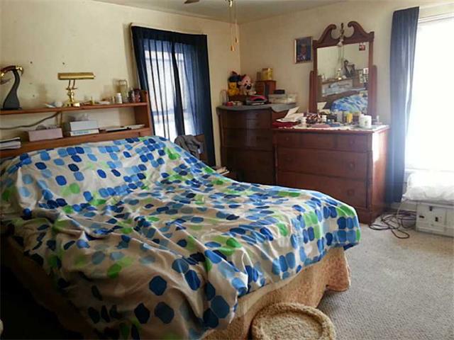 cluttered bedroom Grove City Pennsylvania home house for sale photo