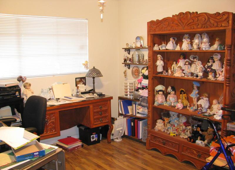 doll collection on display Phoenix Arizona home house for sale real estate photo