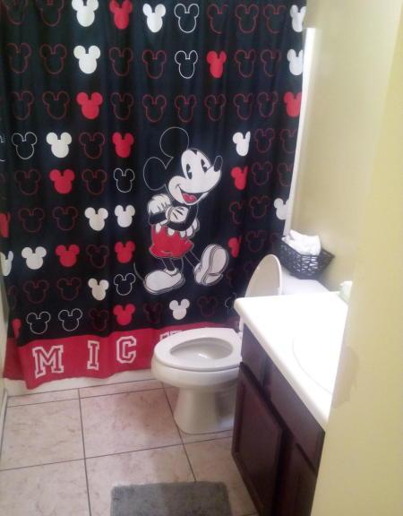 Mickey Mouse shower curtain bathroom Phoenix Arizona home house for sale real estate photo