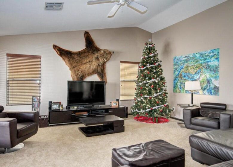 bearskin rug taxidermy dead bear on wall Christmas tree Phoenix Arizona home house for sale real estate photo