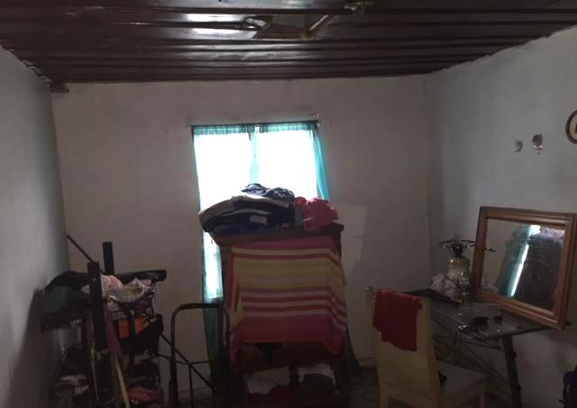 cluttered junky disorganized bedroom Phoenix Arizona home house for sale real estate photo