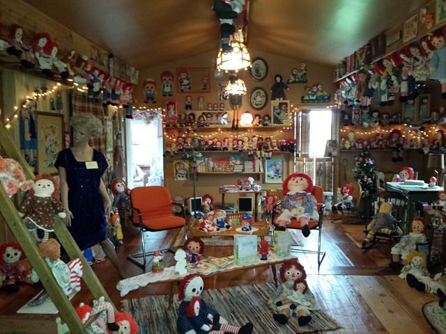 huge massive Raggedy Ann doll collection mannequin cluttered busy Penfield New York home house for sale